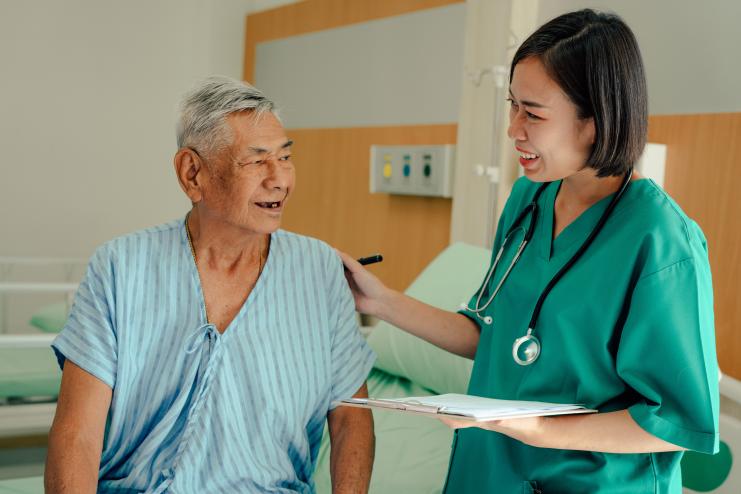 Nurse with elder patient